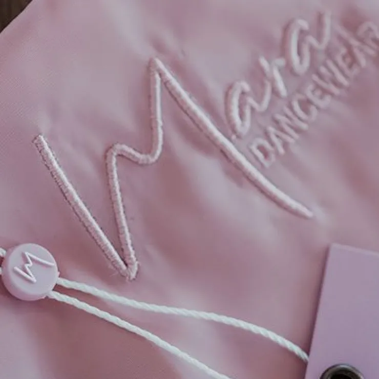 Dame Dansebutikken Beigefarvet pull on mesh skørt fra Mara Dancewear